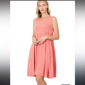 Desert Rose Sleeveless Midi Dress with pockets.